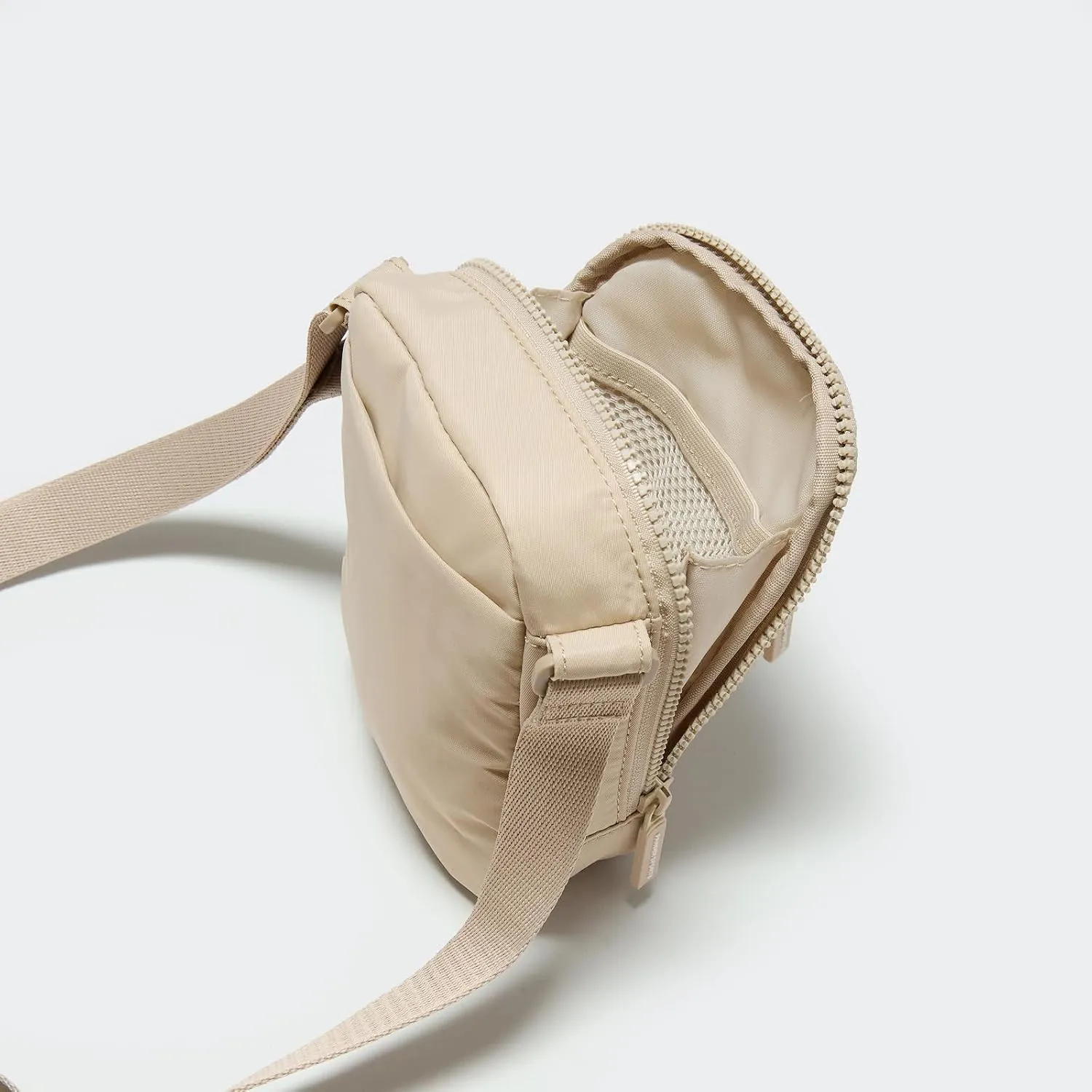 Pander Water-Repellent Crossbody Bag with Adjustable Strap - Perfect for Travel and Everyday Use.